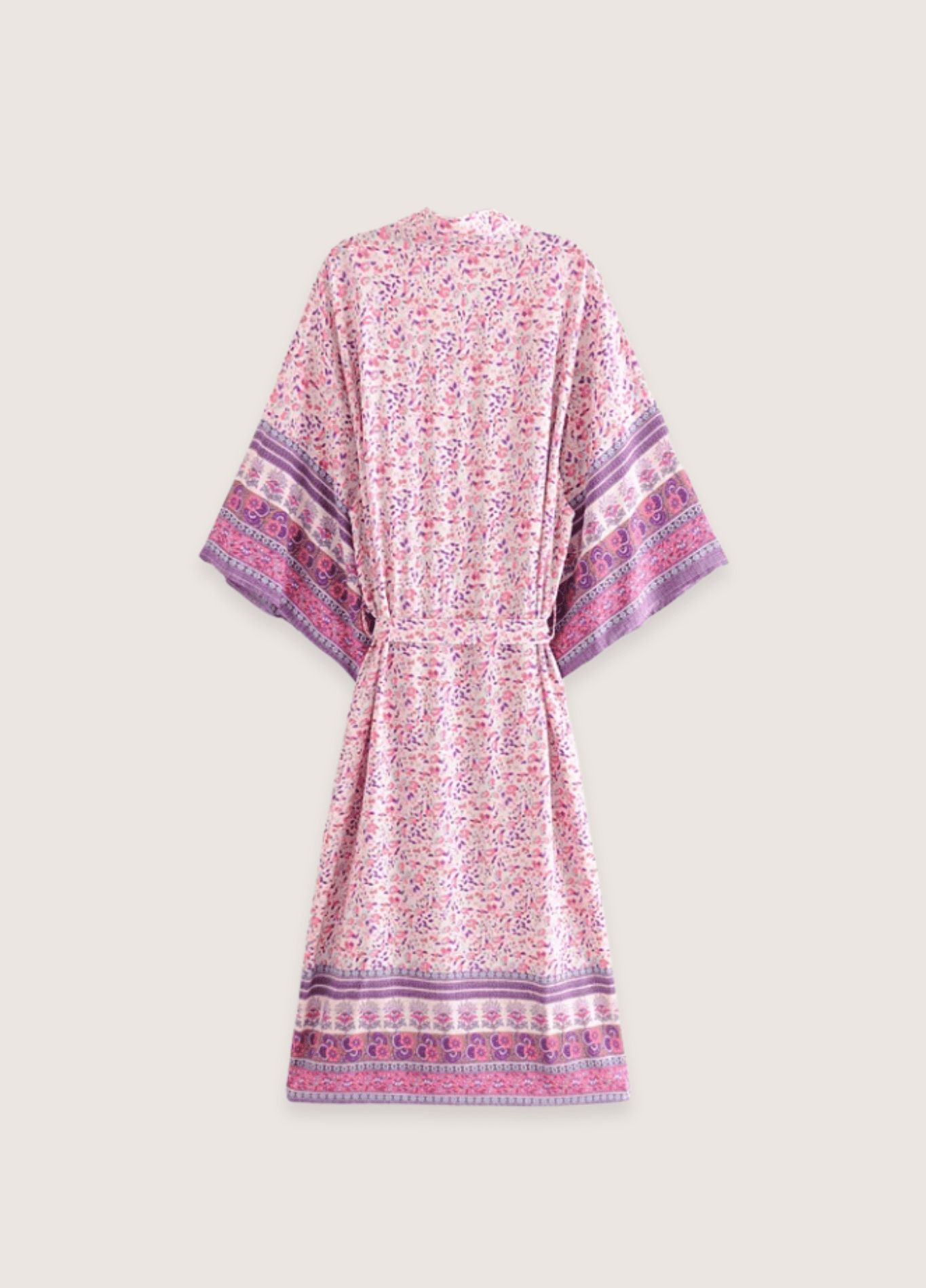 vêtement long rose à motifs fleuris